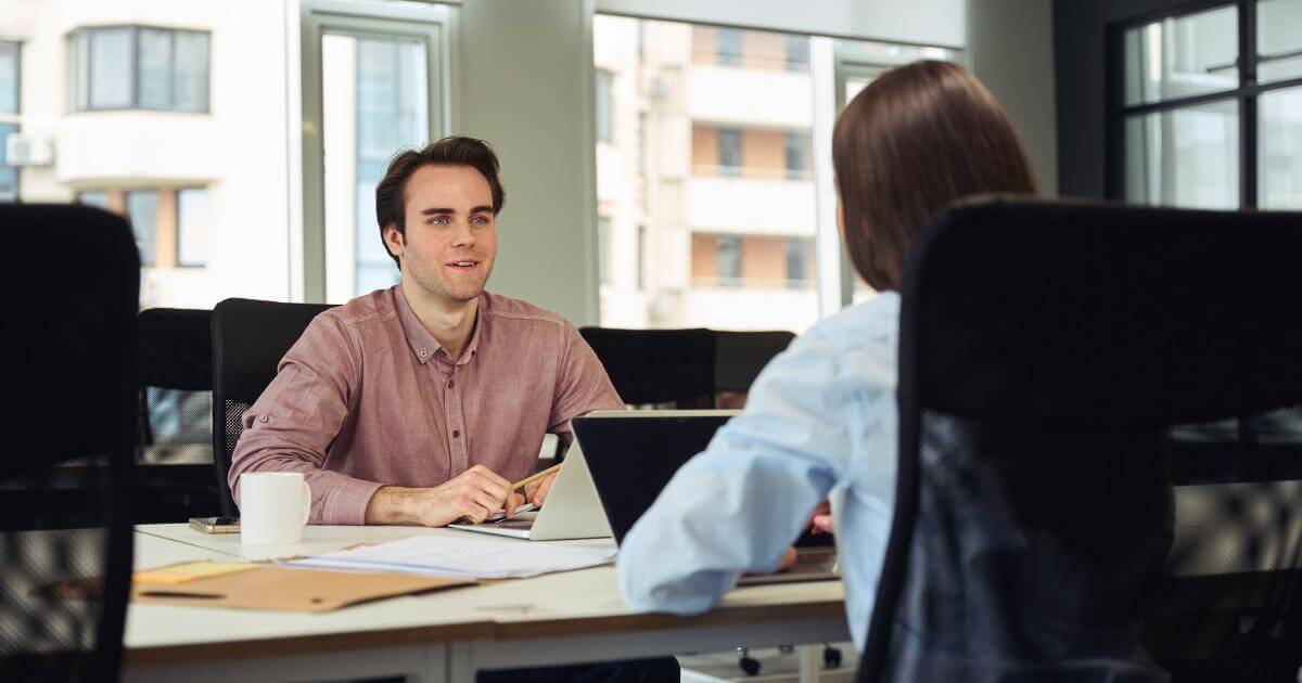 manager and worker in stay interview